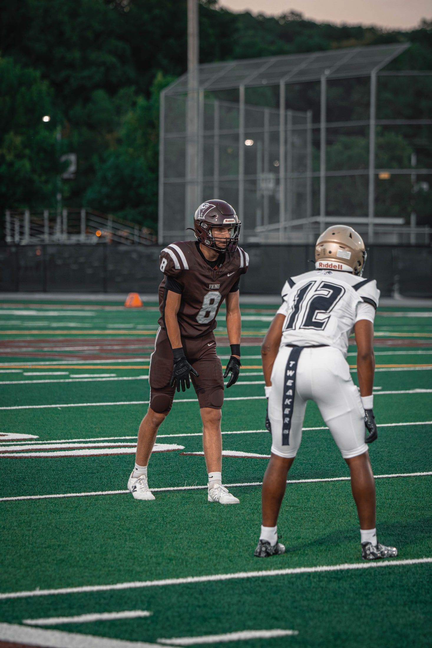 East Lyme number 8 set across from a defender before the snap