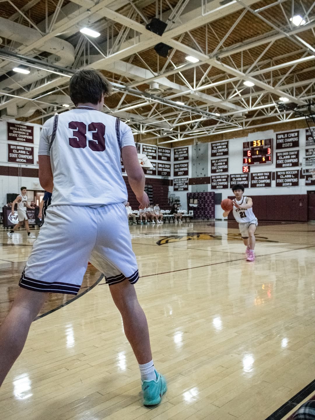 East Lyme players creating a passing lane during a game